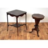An early 20th Century inlaid mahogany occasional table; and a Victorian work table. /