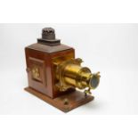 An early 20th Century barrel lens brass and mahogany Magic Lantern