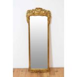 A gilt wall mirror in the Baroque taste