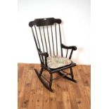 A 20th Century mahogany rocking chair