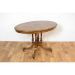 A Victorian burr-walnut loo table.