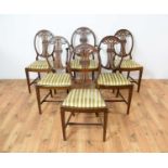 A set of six Hepplewhite style mahogany dining chairs