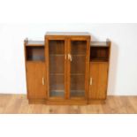 An Art Deco oak china display cabinet