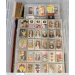 A collection of vintage cigarette cards.