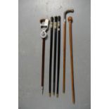 A collection of six 20th century walking sticks