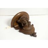 A 19th Century carved walnut corbel