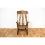 An 20th Century turned wood rocking chair