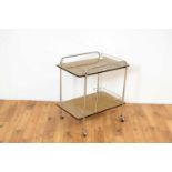 A retro vintage Industrial mid 20th Century two tier drinks trolley