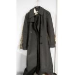 An Aquascutum black trench coat; and an Aquascutum shirt.