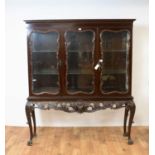 A 20th Century mahogany china display cabinet by Waring and Gillow