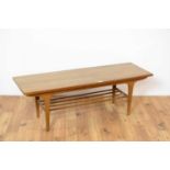 A retro vintage mid 20th Century teak coffee table of rectangular form