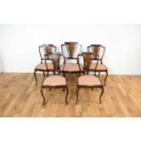 A collection of five Edwardian dining chairs