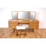 A retro teak dressing table