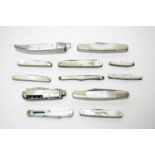 A collection of 20th Century folding knives, with mother-of-pearl grips