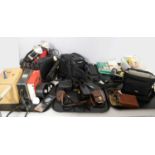 A collection of camera equipment and accessories