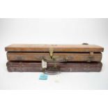 Two mid 20th Century leather gun cases by Holland & Holland
