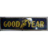 A Good Year enamel advertising sign