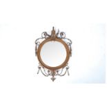 A 20th Century circular wall mirror in the Rococo taste