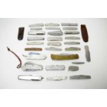 A collection of all metal folding knives