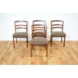 G plan; a retro teak table and four chairs