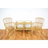 A pair of retro vintage bamboo chairs in the manner of Franco Albini