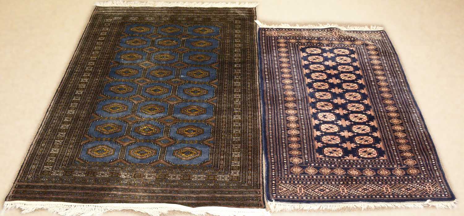 A 20th Century Turkmen rug with another