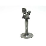 An Art Nouveau bronzed spelter figural candlestick