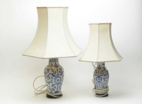 A 19th Century graduated pair of blue and white table lamps