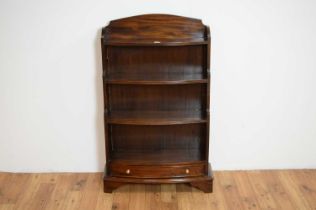 A mahogany waterfall bookcase