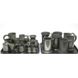 A collection of pewter tankards