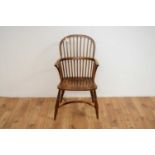 A 19th Century yew and elm comb back Windsor chair