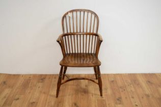 A 19th Century yew and elm comb back Windsor chair