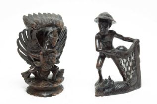 A Japanese carved rootwood sculpture of a fisherman and another carved figure