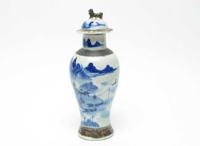 A Chinese blue and white jar with cover