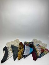 A selection of silk scarfs; and a Durham quilt
