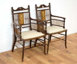 A pair of early 20th Century Edwardian mahogany and inlaid salon chairs