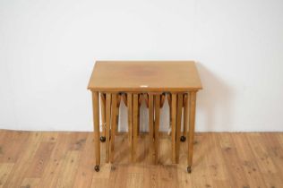 After Poul Hundevad - a retro 20th century Danish inspired drop leaf teak quartetto nest of tables