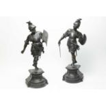 A pair of bronzed figures of Roman soldiers