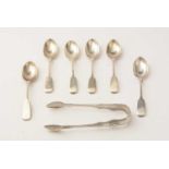 A selection of silver teaspoons, salt spoons and tongs