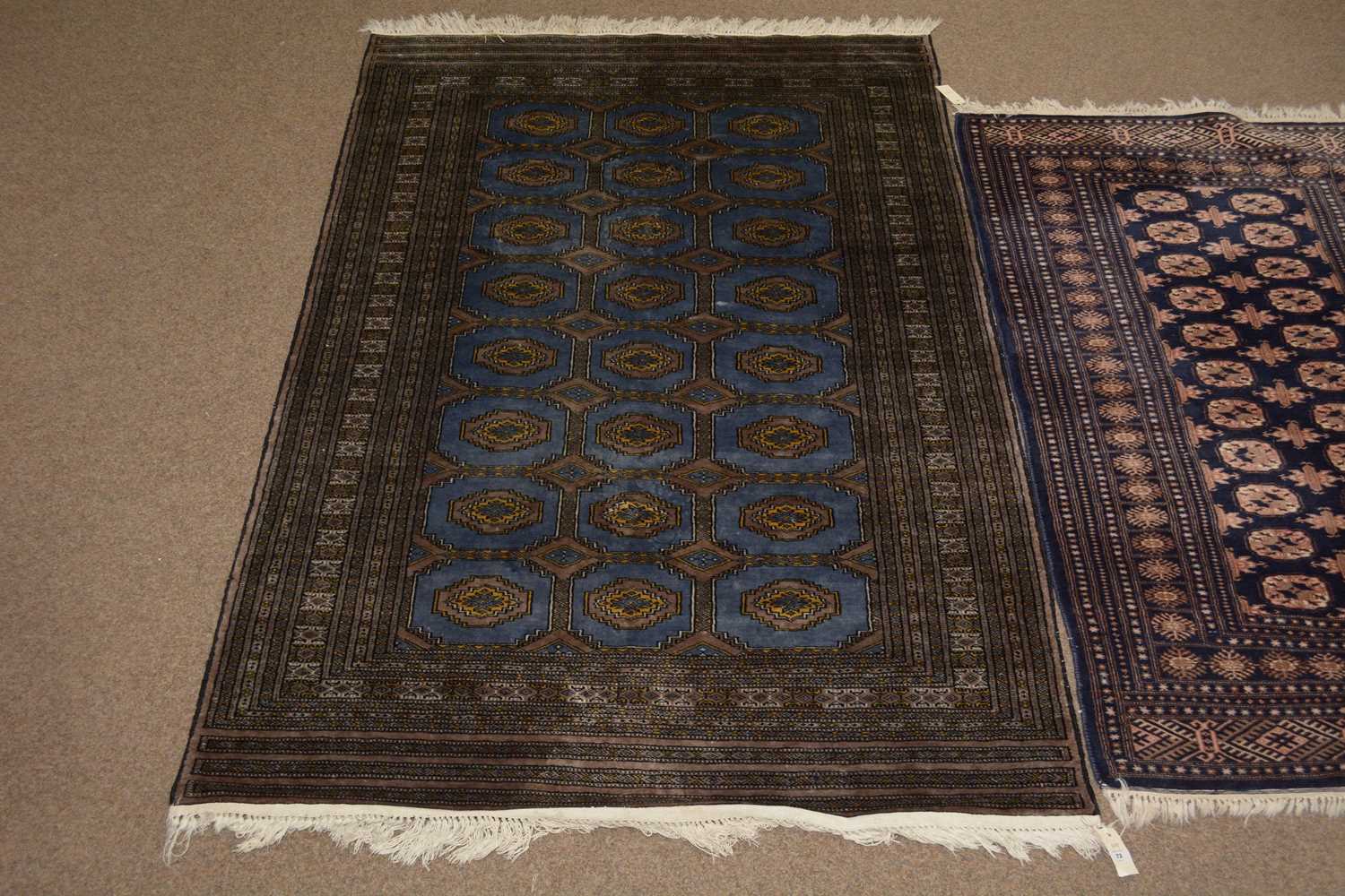 A 20th Century Turkmen rug with another - Image 2 of 5