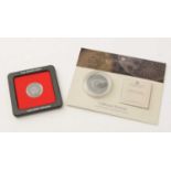 Two antique coins encapsulated by The Royal Mint Collector Services