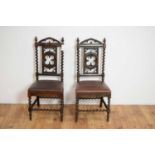 A pair of gothic revival mahogany bedroom chairs