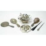 A collection of silver dressing table accessories