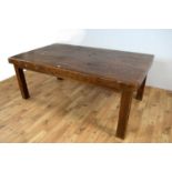 A large rustic contemporary hardwood table