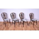 Four 19th Century ash, beech and elm wheelback dining chairs
