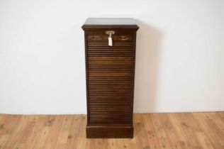 An early 20th Century mahogany tambour fronted filing cabinet