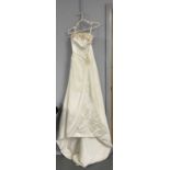 An Alfred Angelo wedding dress; and other dresses