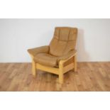 A contemporary Windsor reclining armchair by Ekornes