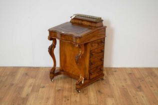 A 19th Century inlaid burr walnut Davenport desk