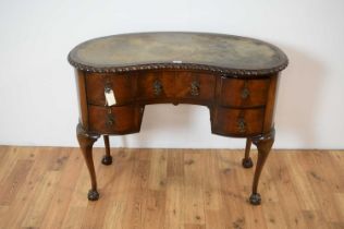 A Queen Anne style mahogany kidney shaped desk